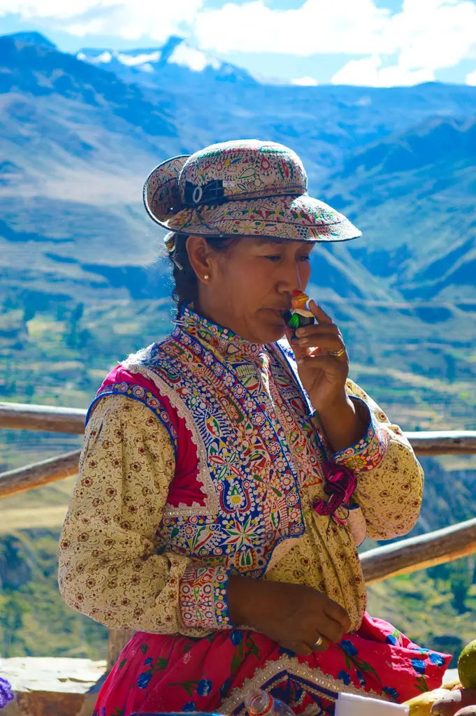 Peruvian woman selling souvenirs at the market at the colca canyon