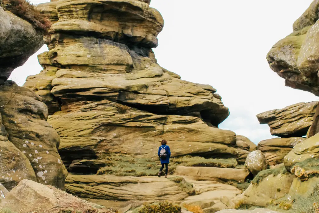 girl walking on natural rock formations