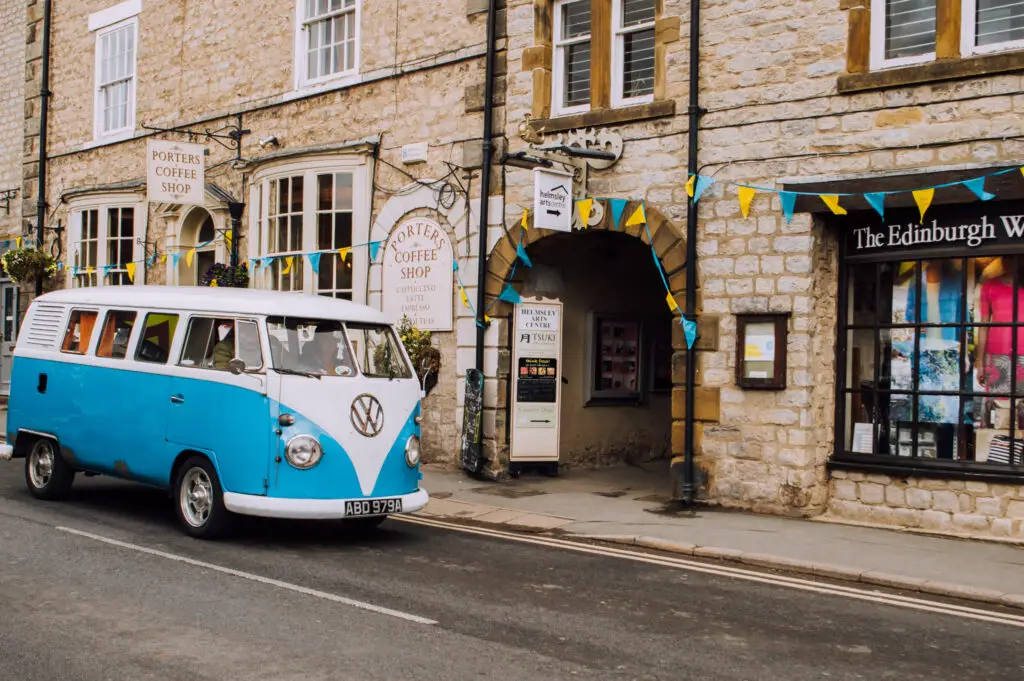 Old VW driving along the street in Helmsley market town