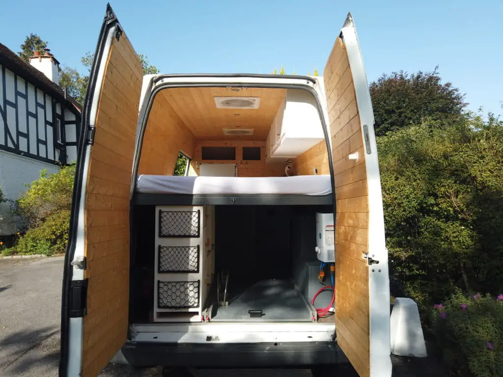 raised bed layout with garage in a van