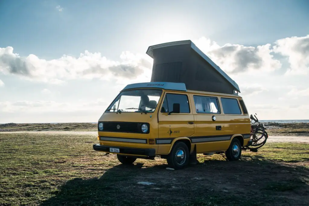 yellow camper van with pop top roof