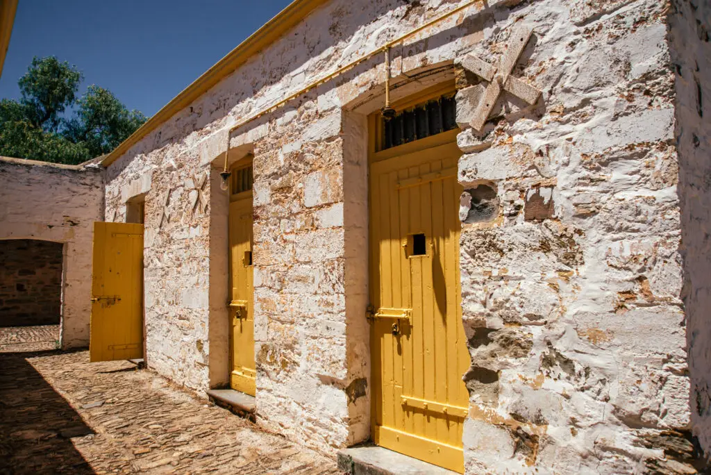 police lock up cells with yellow doors