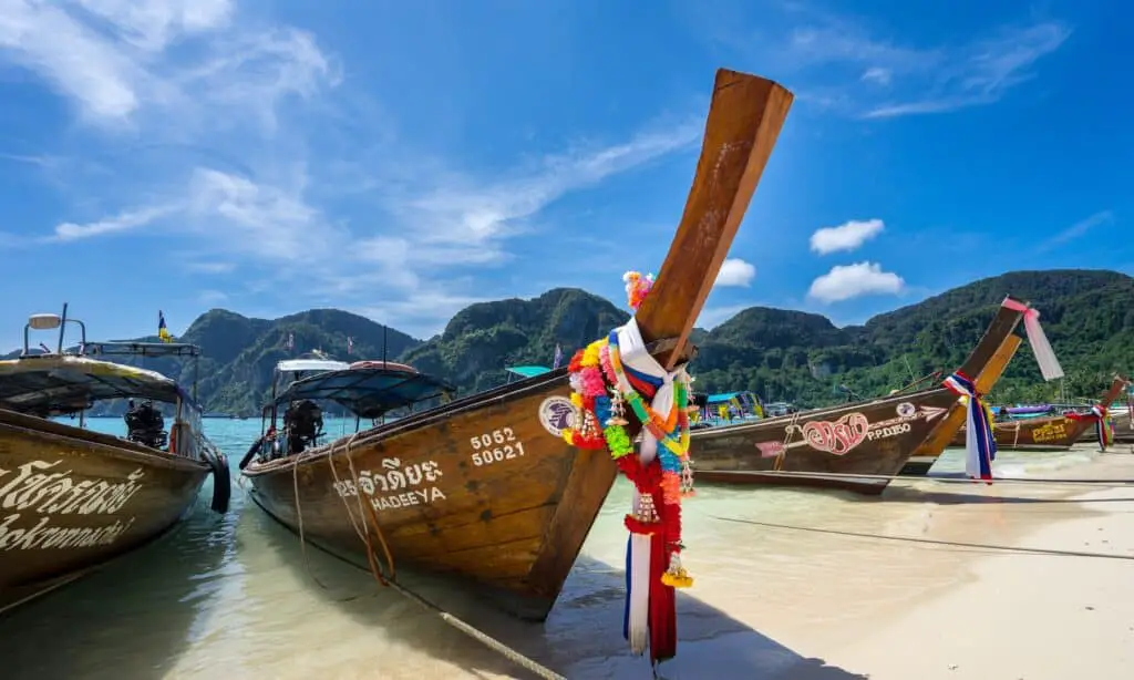 Tourist boat on Thai island beach