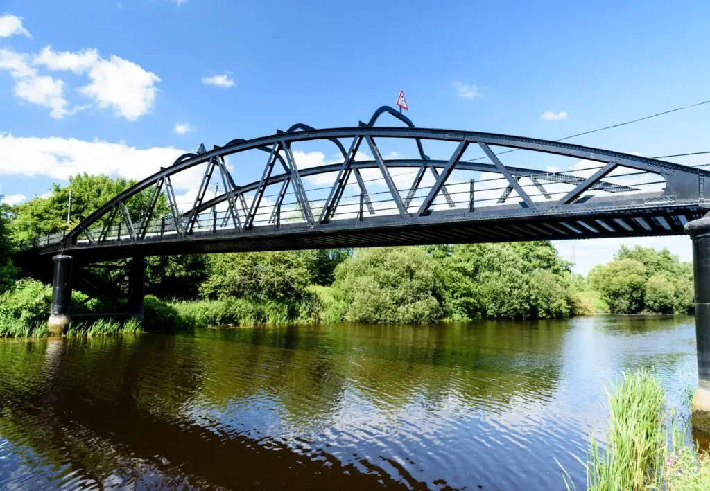 metal Victorian bridge over a river in Ireland