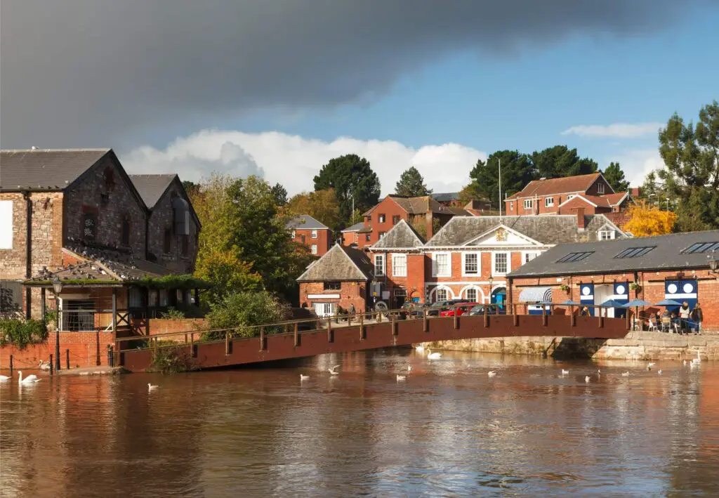 Exeter quayside and houses on a cloudy day in Devon England