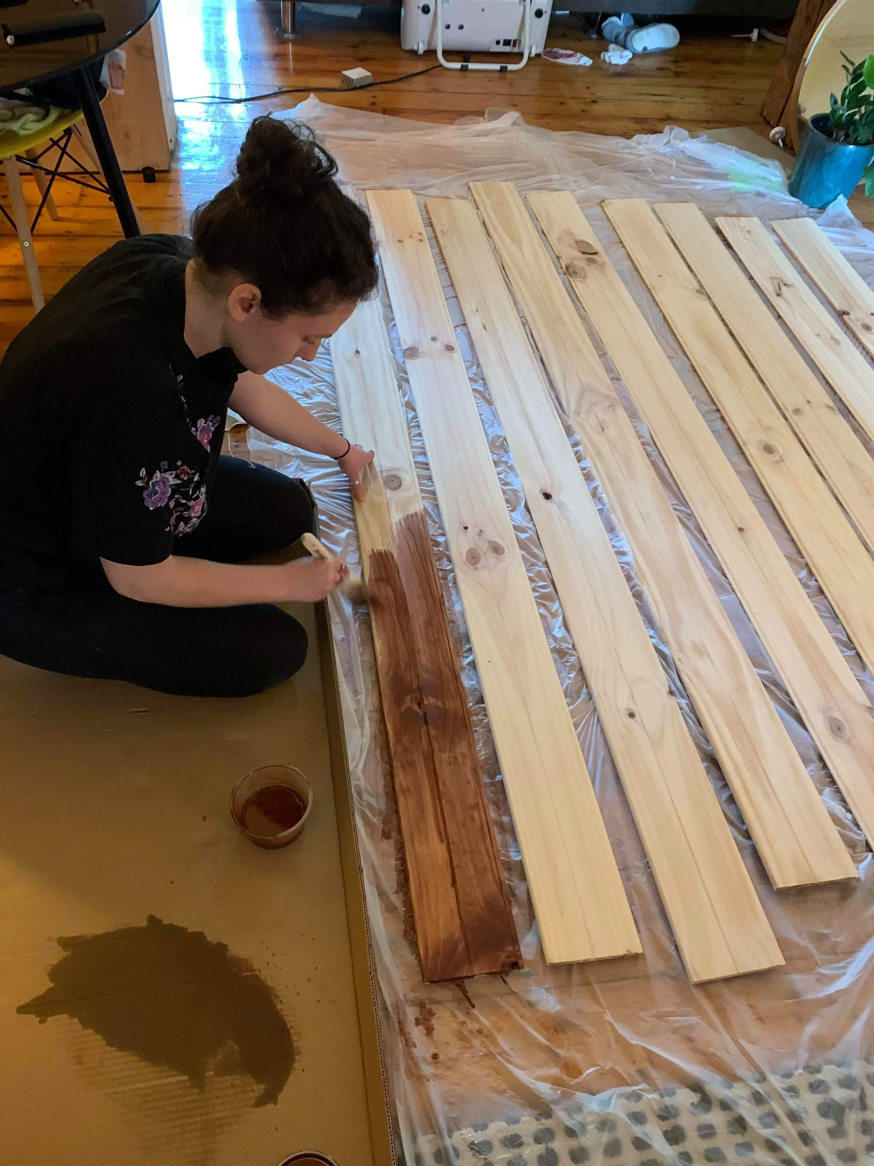 staining planks of wood