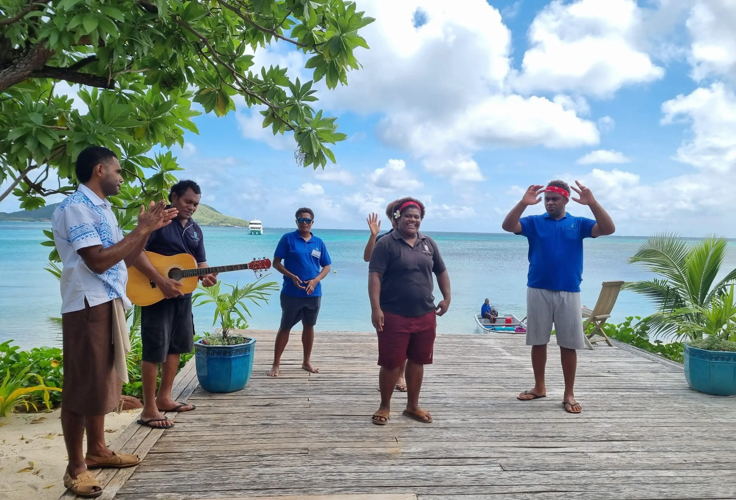 Fiji staff singin farewell song