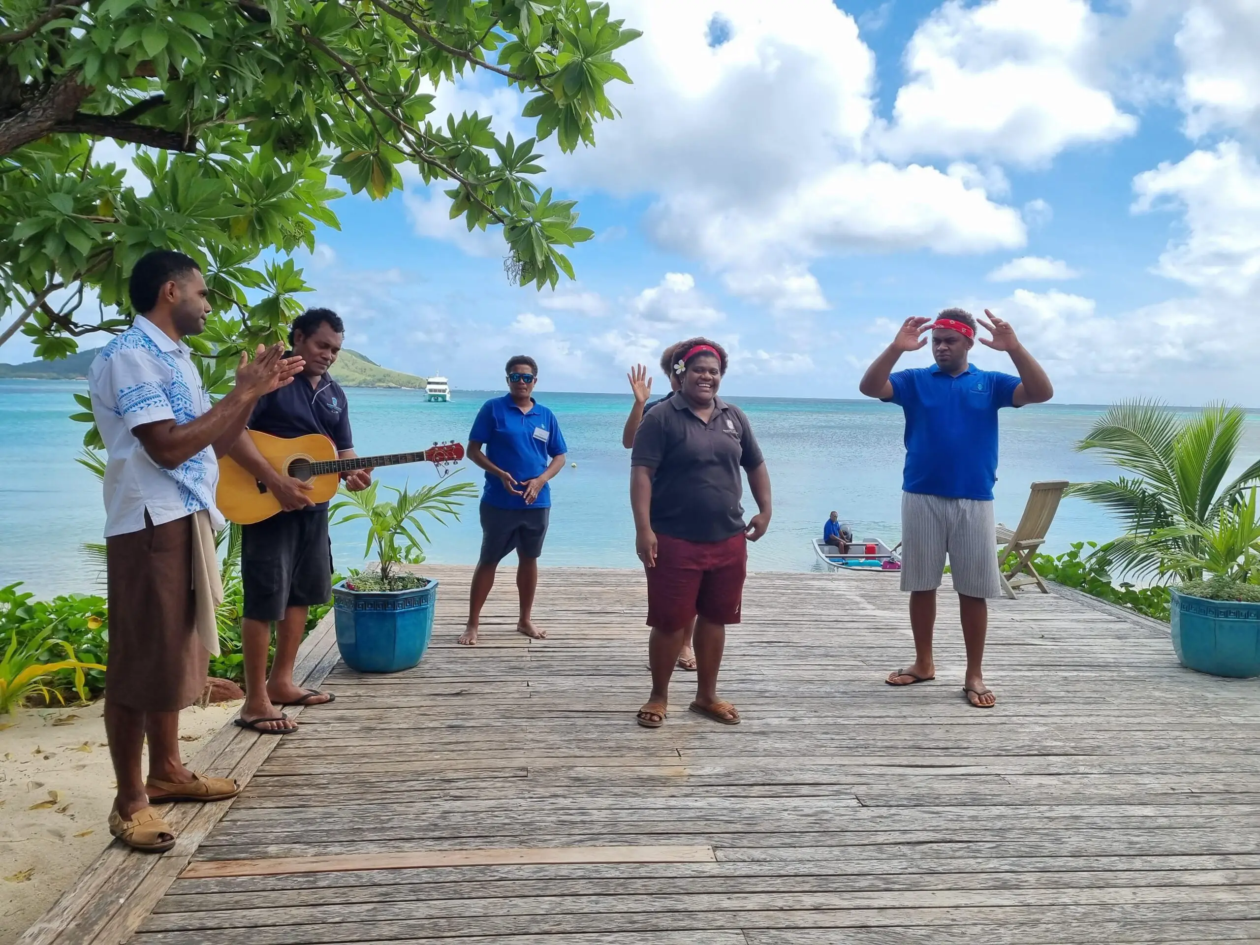 Fiji staff singin farewell song